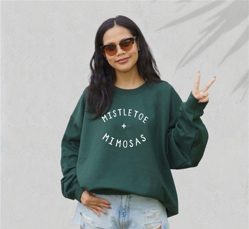 Mistletoe and mimosas sweatshirt hotsell